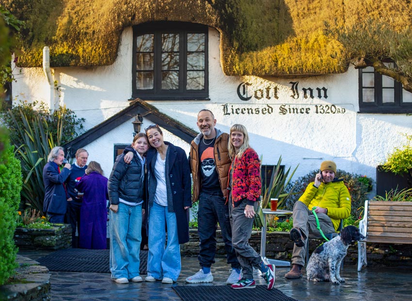 happy family outside the cott inn pub